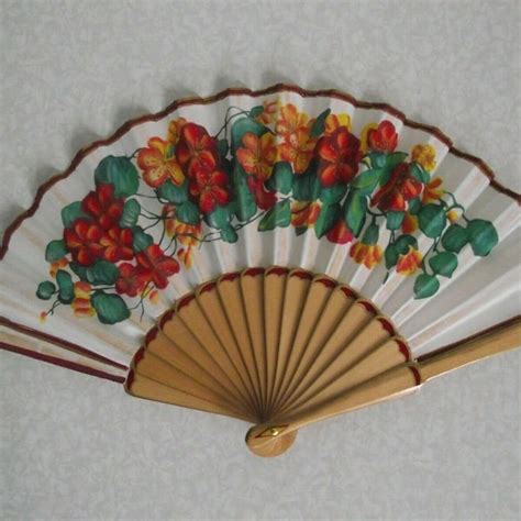 Explore the Elegance and Utility of Wooden Handheld Fans and Related Products